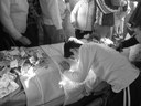 Prayer ritual at the tomb of Ali, black-and-white photograph, August 2006, photographer: Nathalie Clayer; source: in private ownership